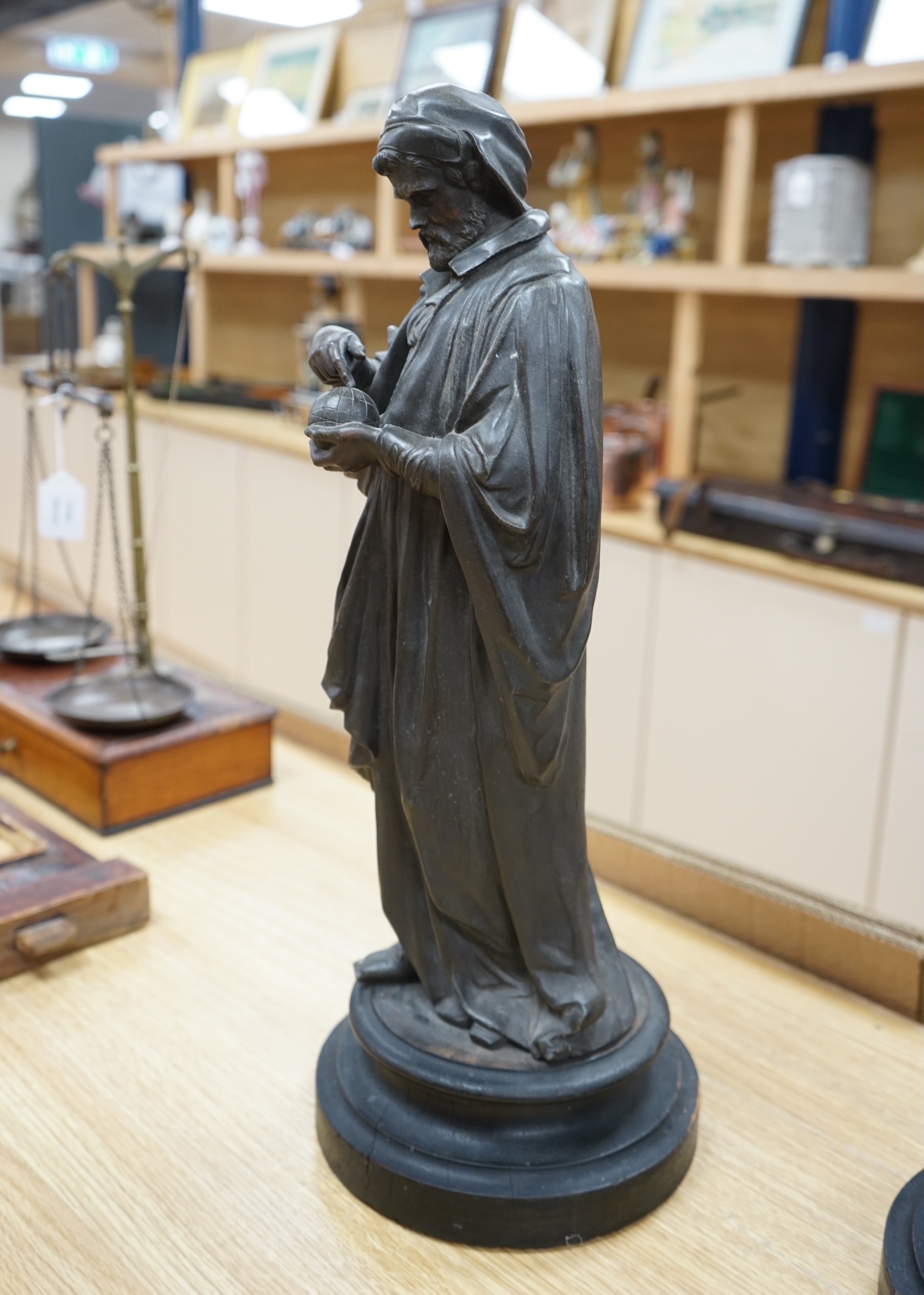 Two bronzed spelter classical figures, possibly Galileo and Leonardo Da Vinci both on turned plinths, 53cm high. Condition - fair, need cleaning plinths need waxing